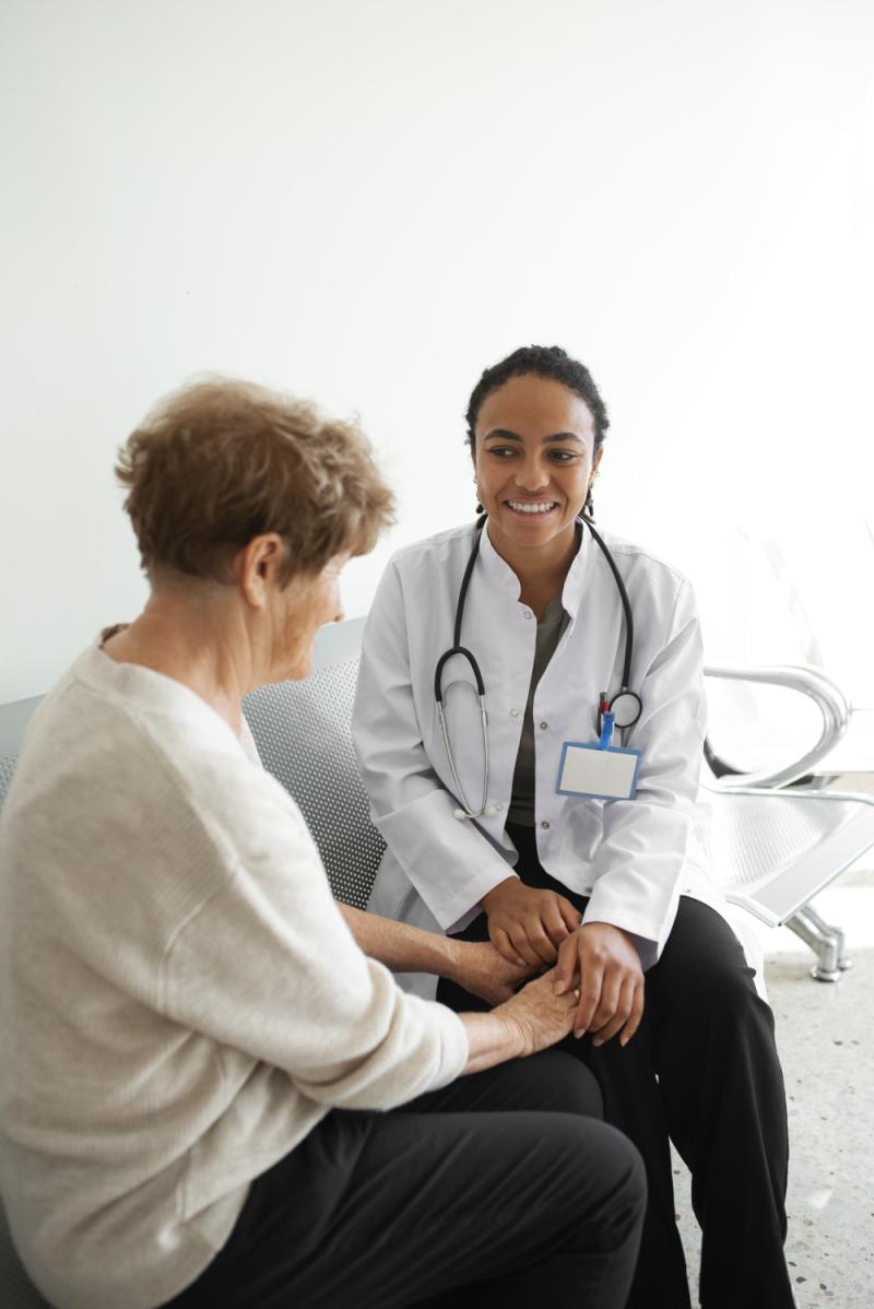 woman doctor talking to a woman patient