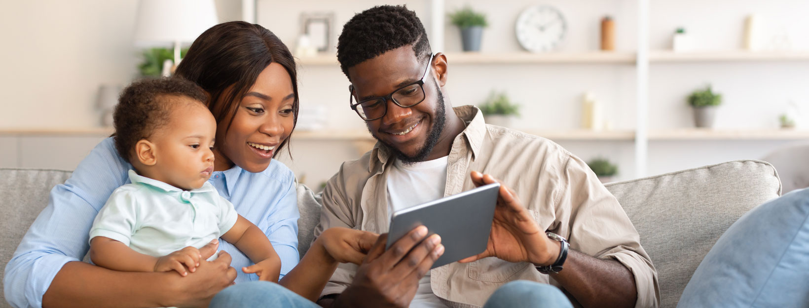 Family reading on a tablet