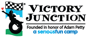 Victory Junction logo black silhouette of kid playing in a tire swing