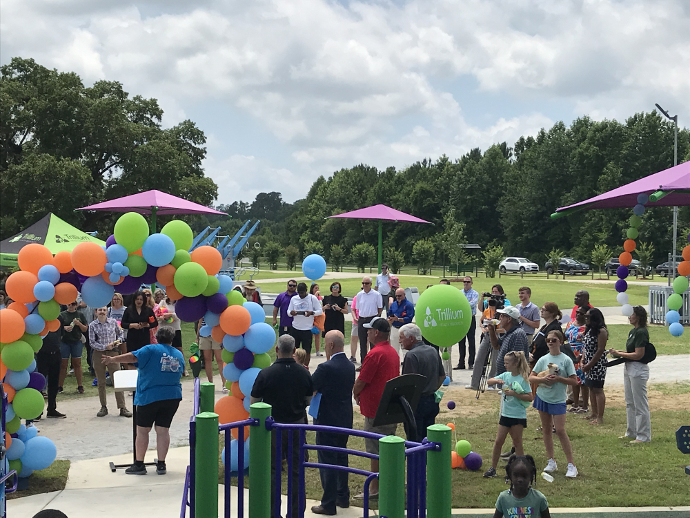 Speecher on the cutting ribbon new playground