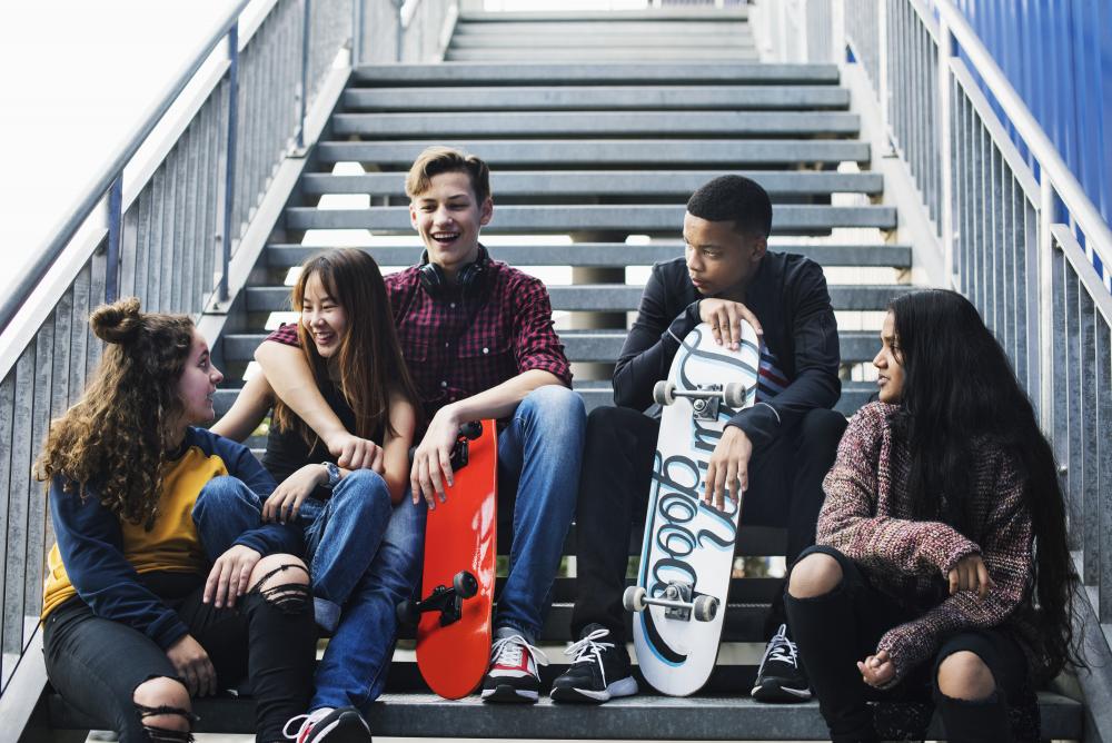 Group of Teenagers chatting on stairs