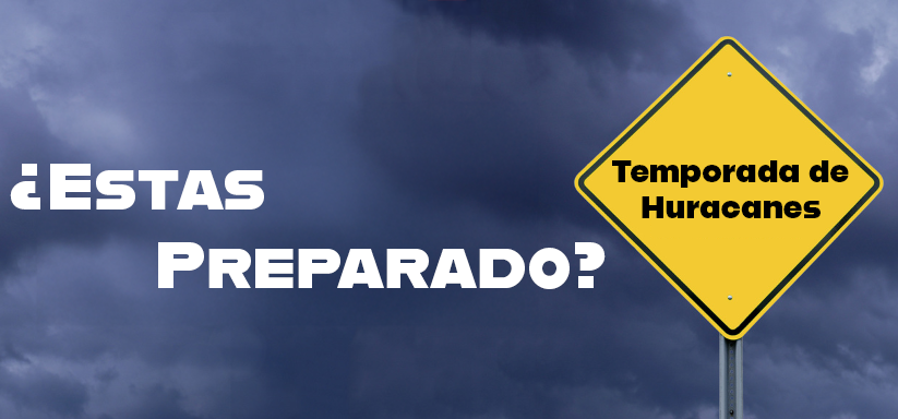 A cloudy sky, yellow sign with the message Hurrican Season