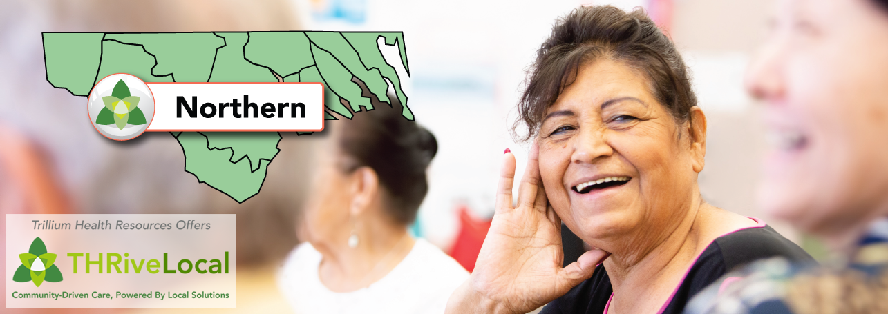 A group of woman laughing, the camera focus is in one of them