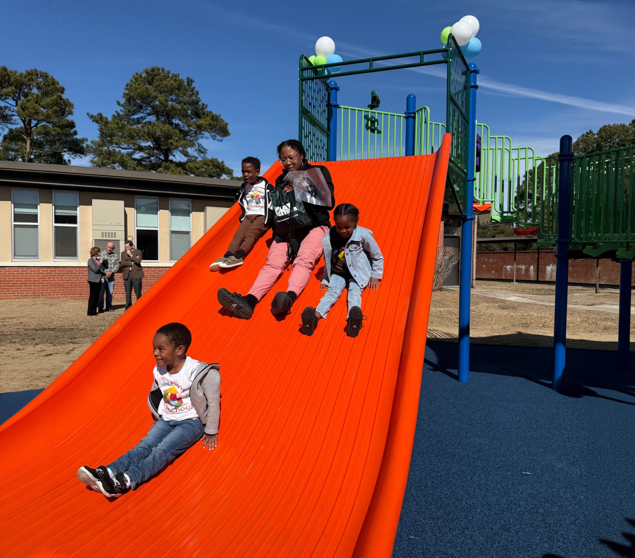Kids going down on the slide